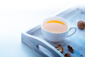 Cup of hot tea on the windowsill