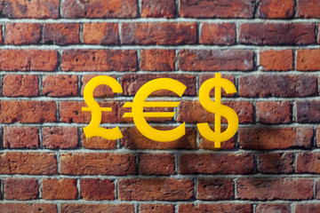 Fototapeta na wymiar International money icon and currency units front of the British style wall