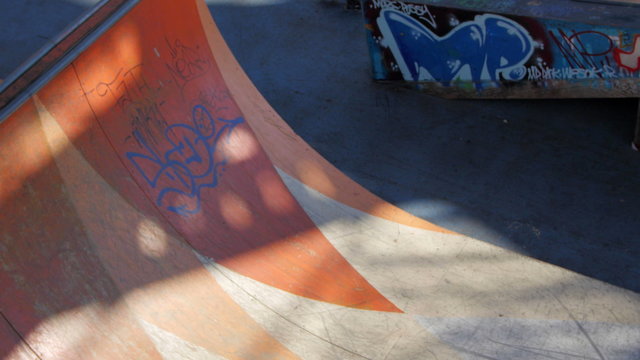 Skater in action on half pipe