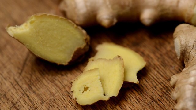 close up moving at a kitchen table with ginger