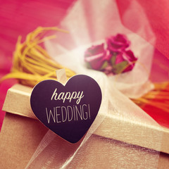 heart-shaped signboard with the text happy wedding