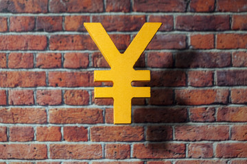 Fototapeta premium International money icon and currency units front of the British style wall