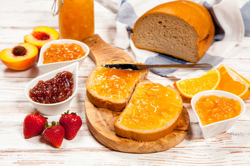Fototapeta na wymiar Slices of bread with jam