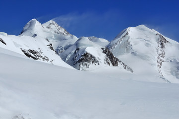 Fototapeta na wymiar Castor, Pollux and Liskamm in the Swiss Alps