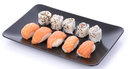 Foto op Plexiglas Japanese sushi set on a black plate © thodonal