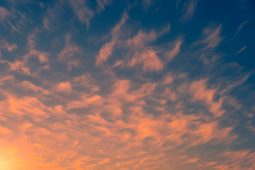 Colorful dramatic sky with cloud at sunset.