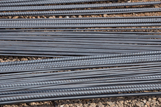 Steel rods or bars used to reinforce concrete