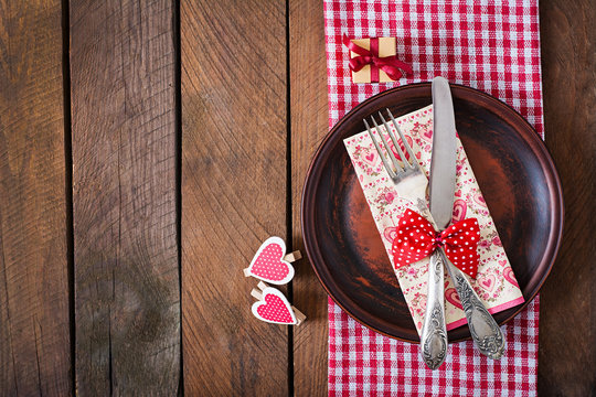Romantic table setting for Valentines day in a rustic style. Top view