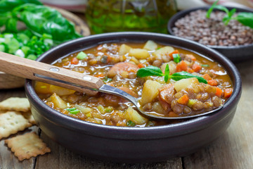 Homemade soup with lentils and sausages
