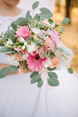 Bride holding a bouquet of flowers, wedding bouquet