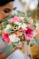 Bride holding a bouquet of flowers, wedding bouquet