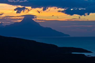 Greek coast of aegean sea at sunrise near holy mountain Athos