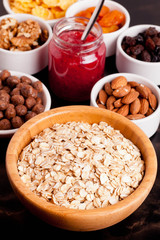oat flakes and various delicious ingredients for breakfast