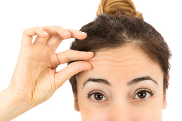 Wrinkles on female forehead