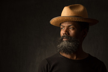 Black African American man portrait wearing a hat
