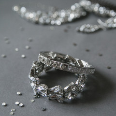 Jewelry diamond ring on the grey background.