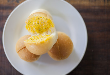 Sliced of round bread with butter