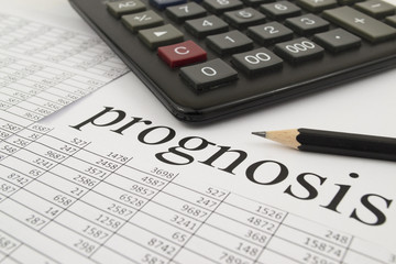 a calculator, a table with figures on a white background
