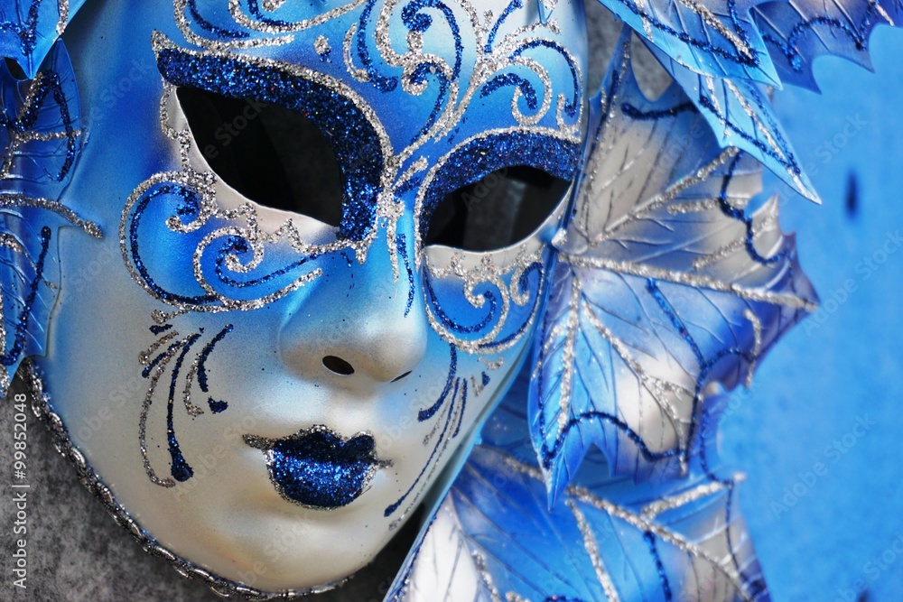 Wall mural Blue Venetian carnival mask in Venice, Italy