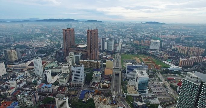 Aerial view of Kuala Lumpur city in Malaysia capital, tall buildings.