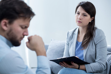 Man on consultation with psychologist