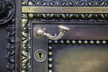 bronze metal antique door handle closeup