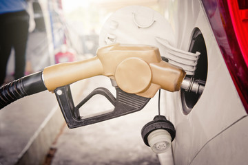 Obraz premium Car refueling on a petrol station.