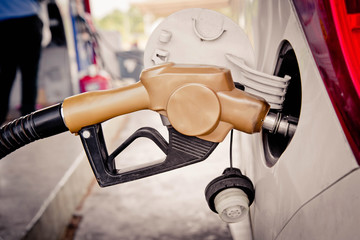 Obraz premium Car refueling on a petrol station.