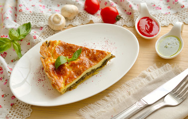 Quiche is a savoury, open-faced pastry crust with a filling of s
