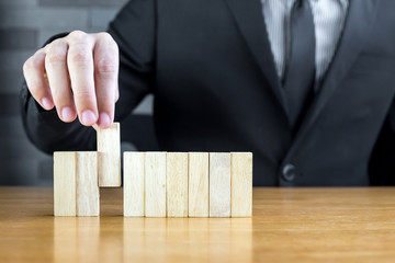 Businessman choosing the wood block, Recruitment concept