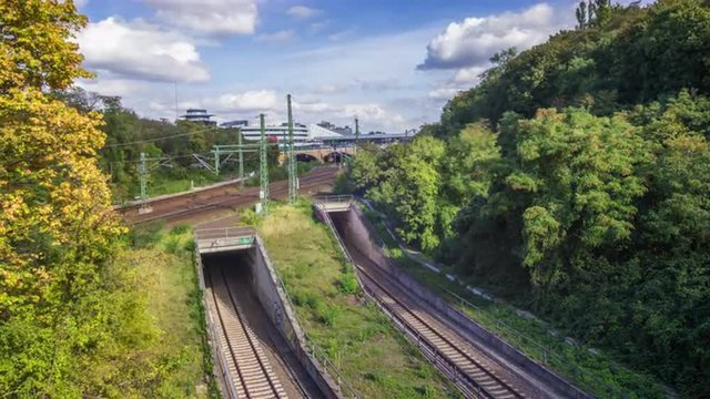 Time lapse of German trains by a trafficked train station
