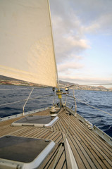 Naklejka na ściany i meble Yacht sailing in Atlantic ocean.Tenerife,Canary Islands.