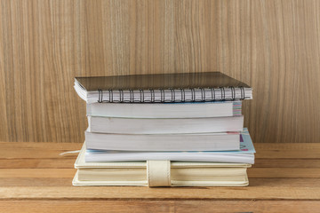 A lot of books on a wooden table. With paths layer