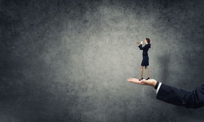 Obraz premium Palm supporting businesswoman