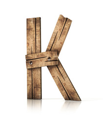 Single wooden K letter isolated on the white background. 3d illustration. wooden font.