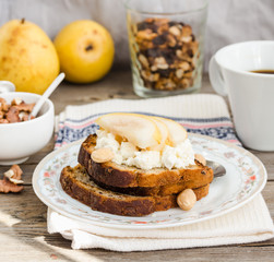 toast for breakfast with sweet cream cheese and pear, a cup of c