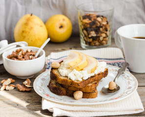 toast for breakfast with sweet cream cheese and pear, a cup of c