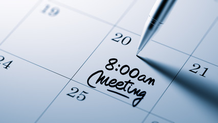 Closeup of a personal agenda setting an important date written w