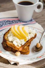 toast for breakfast with sweet cream cheese and pear, coffee