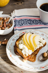 crisp toast for breakfast with sweet cream cheese and pear