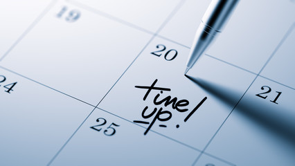 Closeup of a personal agenda setting an important date written w