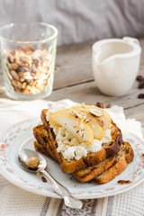 crisp toast for breakfast with cream cheese and  sweet pear
