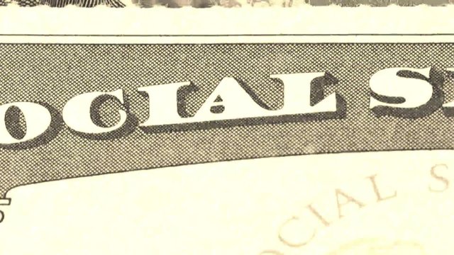 Social security card retirement benefits concept