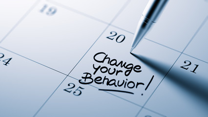 Closeup of a personal agenda setting an important date written w