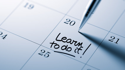 Closeup of a personal agenda setting an important date written w