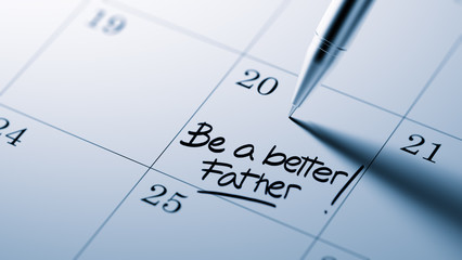 Closeup of a personal agenda setting an important date written w