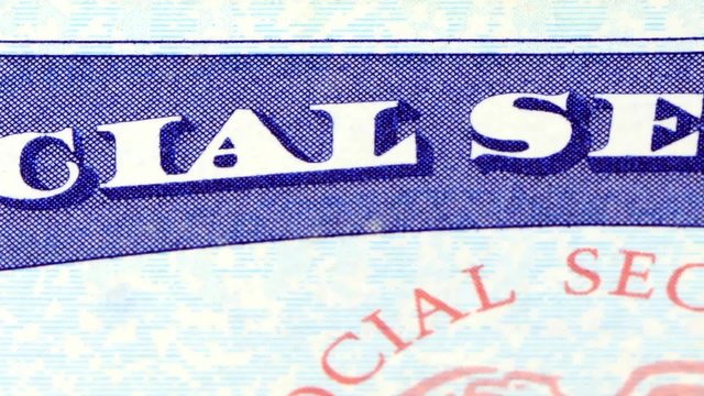 Social security card retirement benefits concept