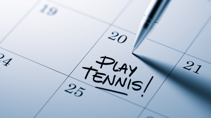 Closeup of a personal agenda setting an important date written w