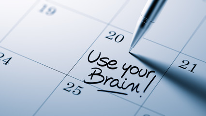 Closeup of a personal agenda setting an important date written w