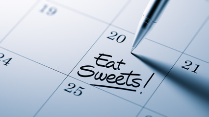 Closeup of a personal agenda setting an important date written w